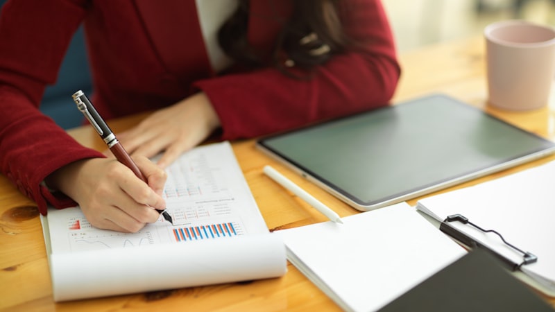 HR professional reviewing feedback data